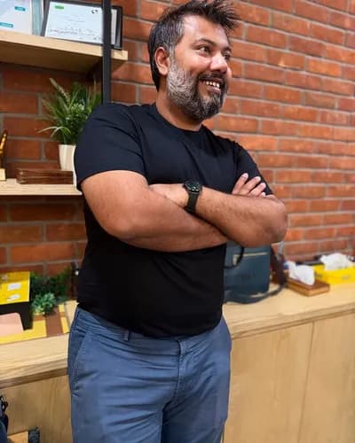 Yash Shah, Founder & CEO of Momentum91, wearing a Boring Label premium Supima cotton round neck t-shirt